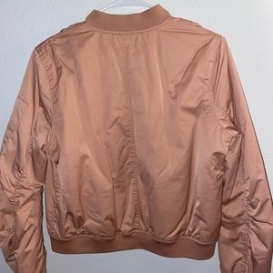 Cute pink jacket to compliment a fall/winter fit. Fairly used.